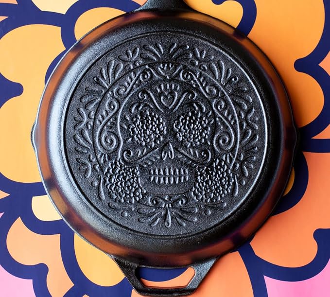 Lodge 10.25 Inch Pre-Seasoned Cast Iron Stamped Skillet - Signature Teardrop Handle - Use in the Oven, on the Stove, on the Grill, or Over a Campfire - Sugar Skull