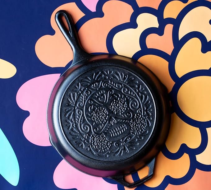 Lodge 10.25 Inch Pre-Seasoned Cast Iron Stamped Skillet - Signature Teardrop Handle - Use in the Oven, on the Stove, on the Grill, or Over a Campfire - Sugar Skull